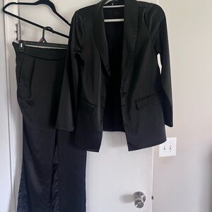 Silky Womes Black Two-Piece Suit Jacket and Trousers
